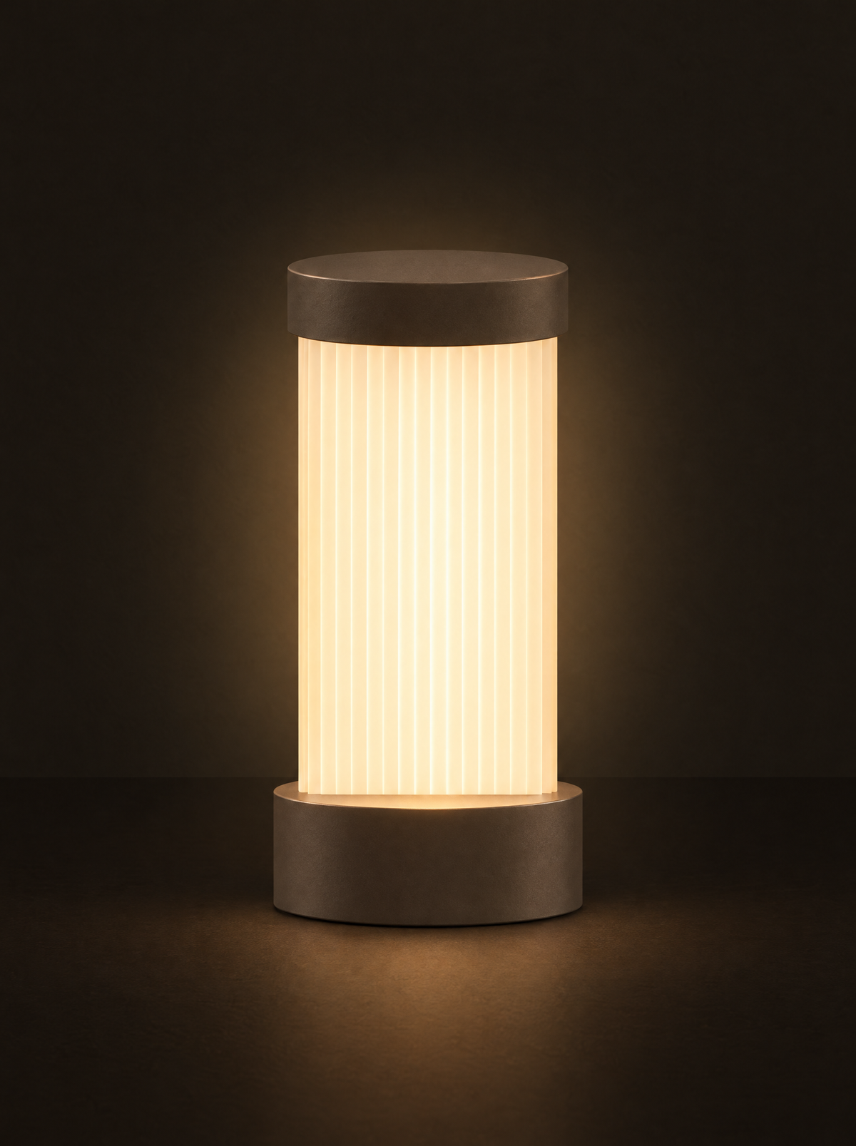 Doric table lamp: a fluted column shade glowing warm white between a dark taupe cap and base